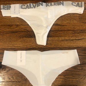 Four pairs of Calvin Klein thong underwear in large